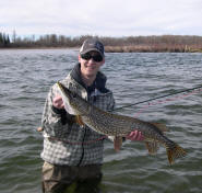 Tim with a personal-best pike caught on the fly